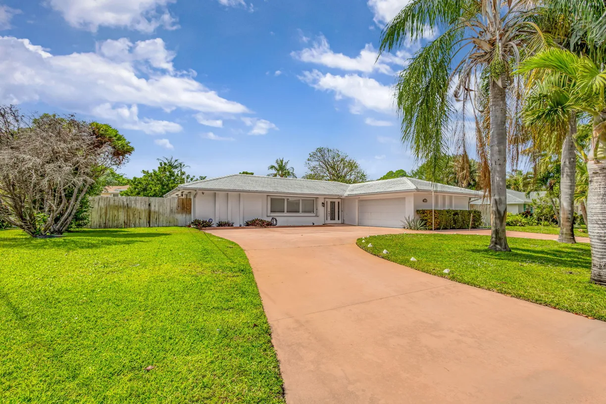 South Florida Real Estate | View 8111 W Lake Drive | 3 Beds, 2 Baths