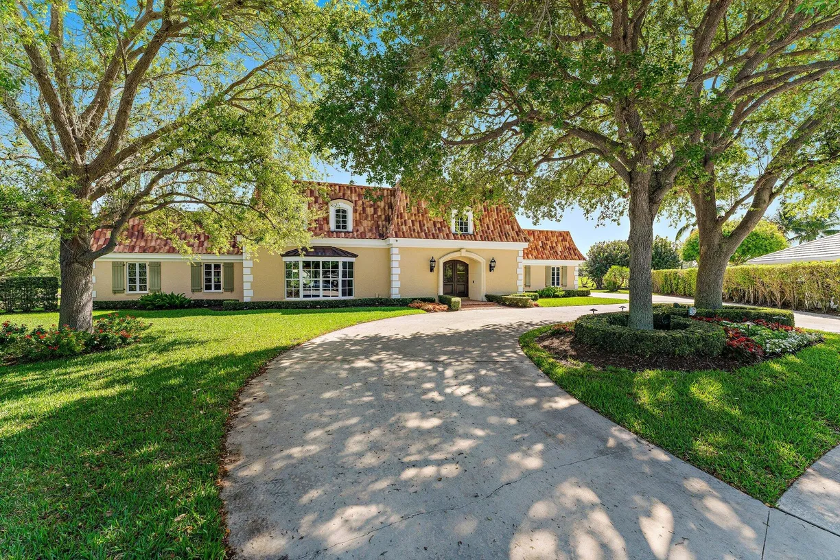 South Florida Real Estate | View 1132 Country Club Drive | 4 Beds, 4 Baths