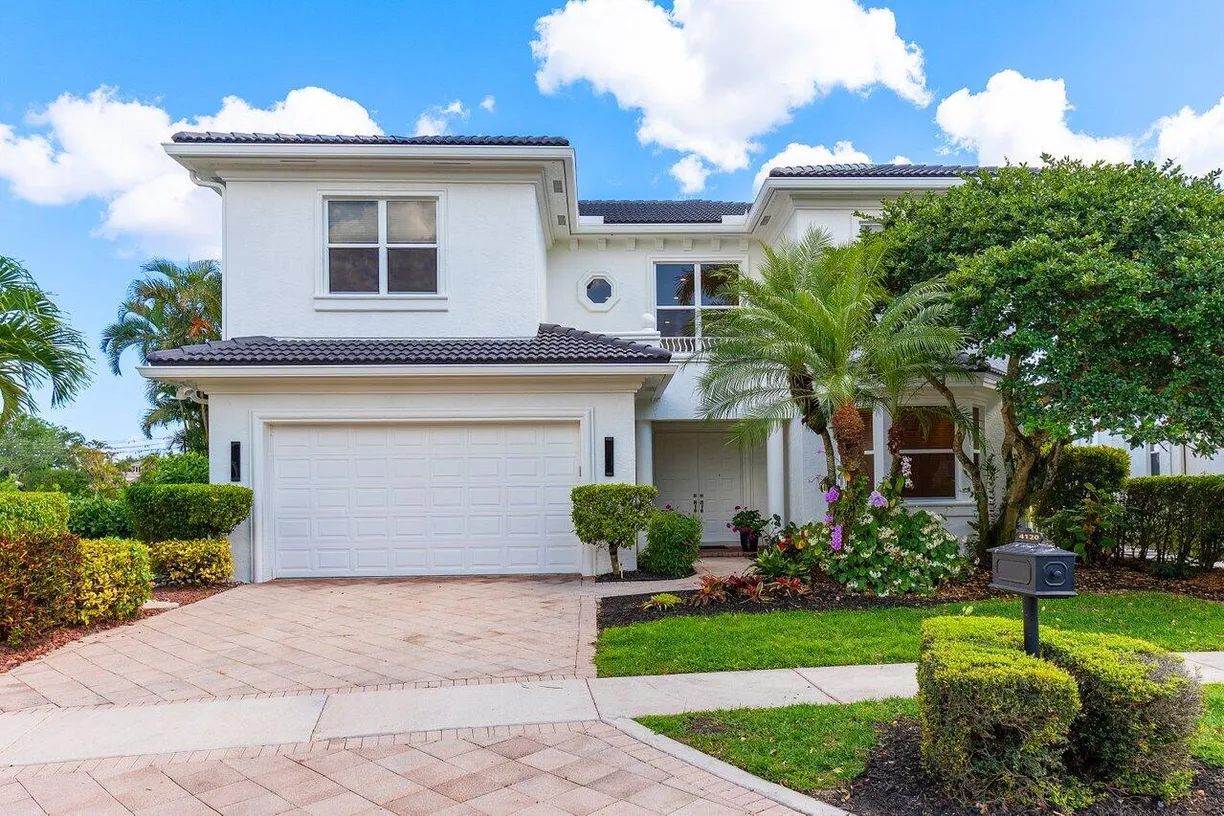 South Florida Real Estate | View 4120 NW Briarcliff Circle | 4 Beds, 4 Baths