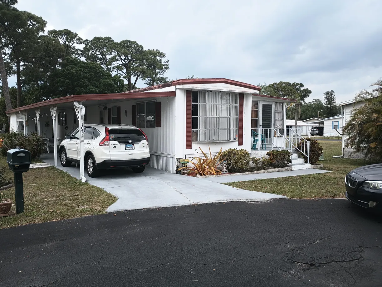 South Florida Real Estate | View 102 Oneida Circle | 2 Beds, 1 Bath