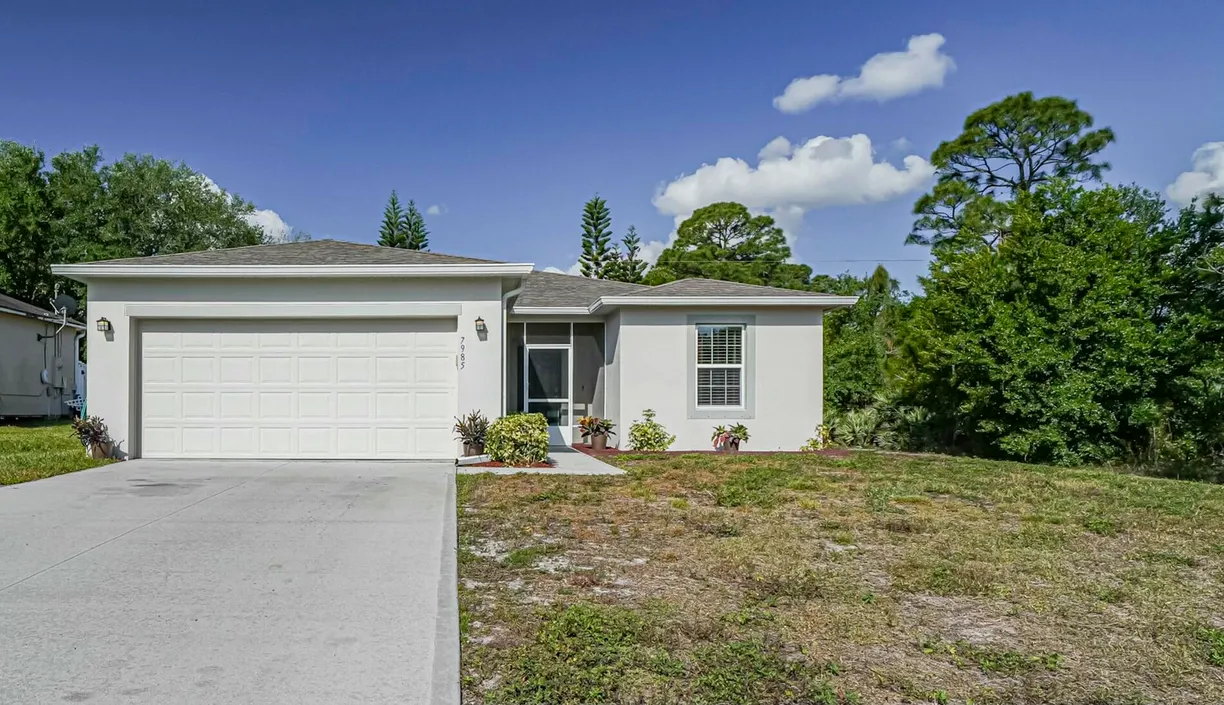South Florida Real Estate | View 7985 100th Court | 3 Beds, 2 Baths