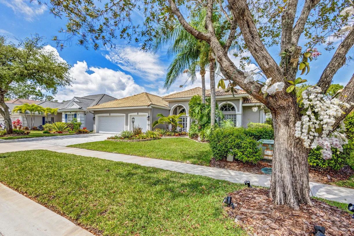 South Florida Real Estate | View 3439 SE Fairway Oaks Trail | 4 Beds, 3 Baths