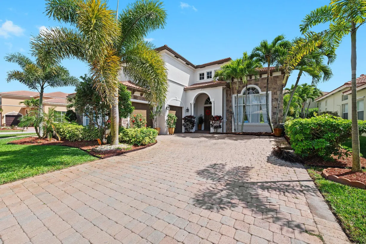 South Florida Real Estate | View 8697 Cobblestone Point Circle | 5 Beds, 3 Baths
