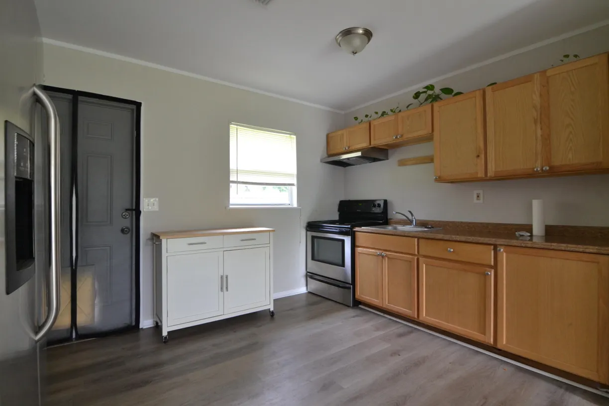 South Florida Real Estate | View 1297 NW Charlie Green Drive | 3 Beds, 2 Baths