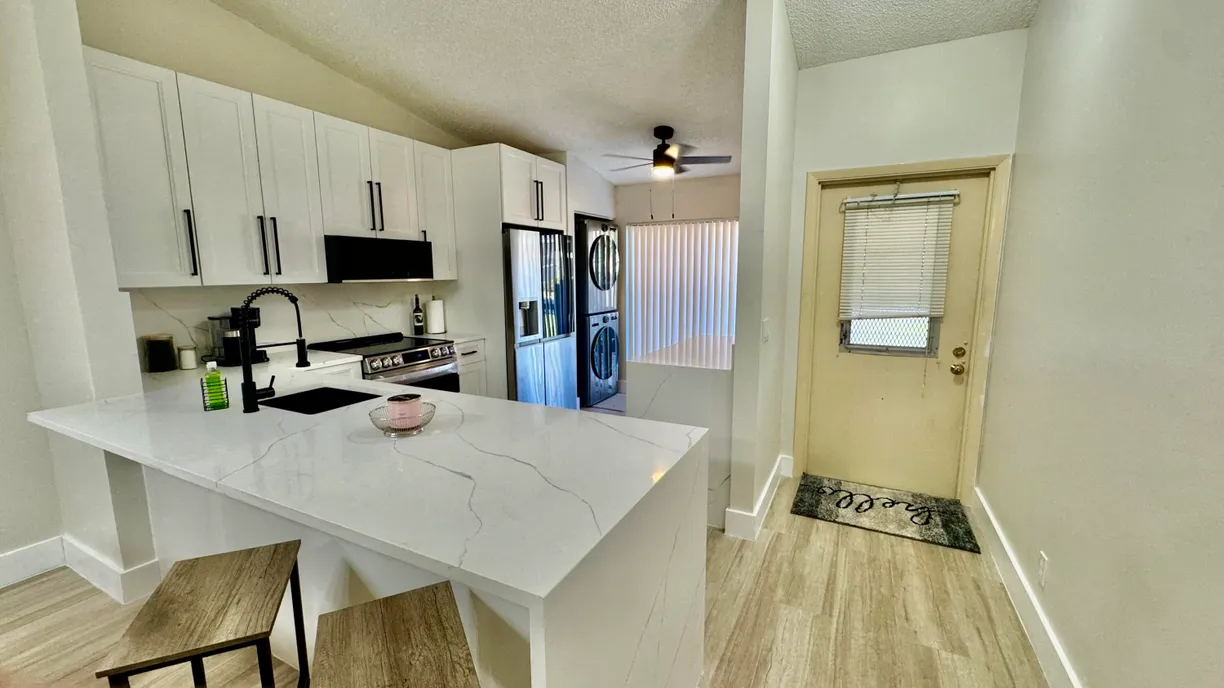 South Florida Real Estate | View 705 Sunny Pine Way, Apt E | Listing