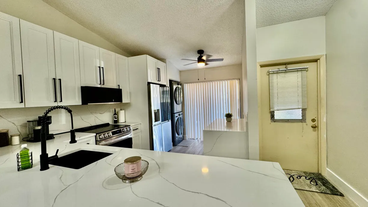 South Florida Real Estate | View 705 Sunny Pine Way, Apt E | 2 Beds, 2 Baths