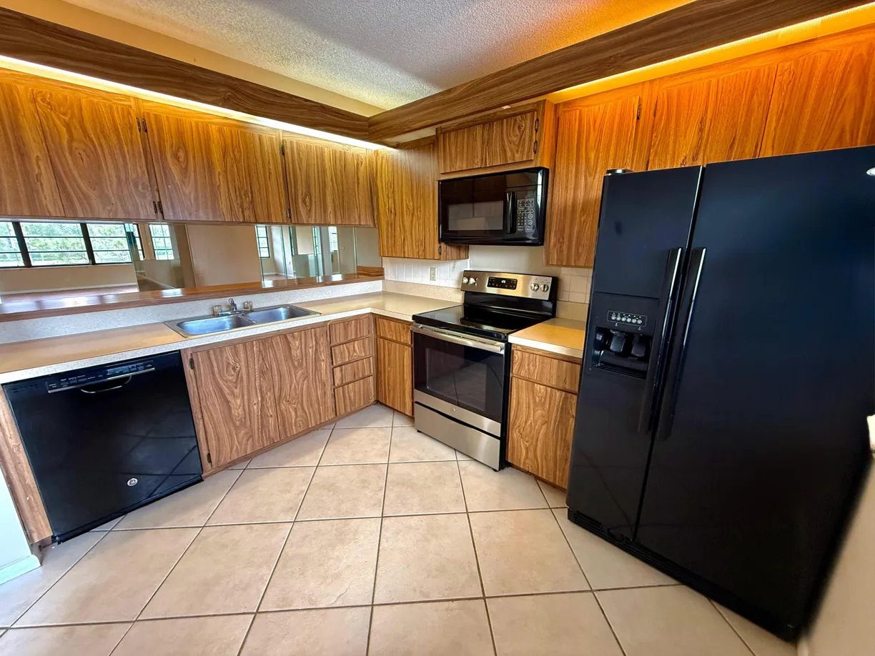 South Florida Real Estate | View 3525 Village Boulevard, 303 | 2 Beds, 2 Baths