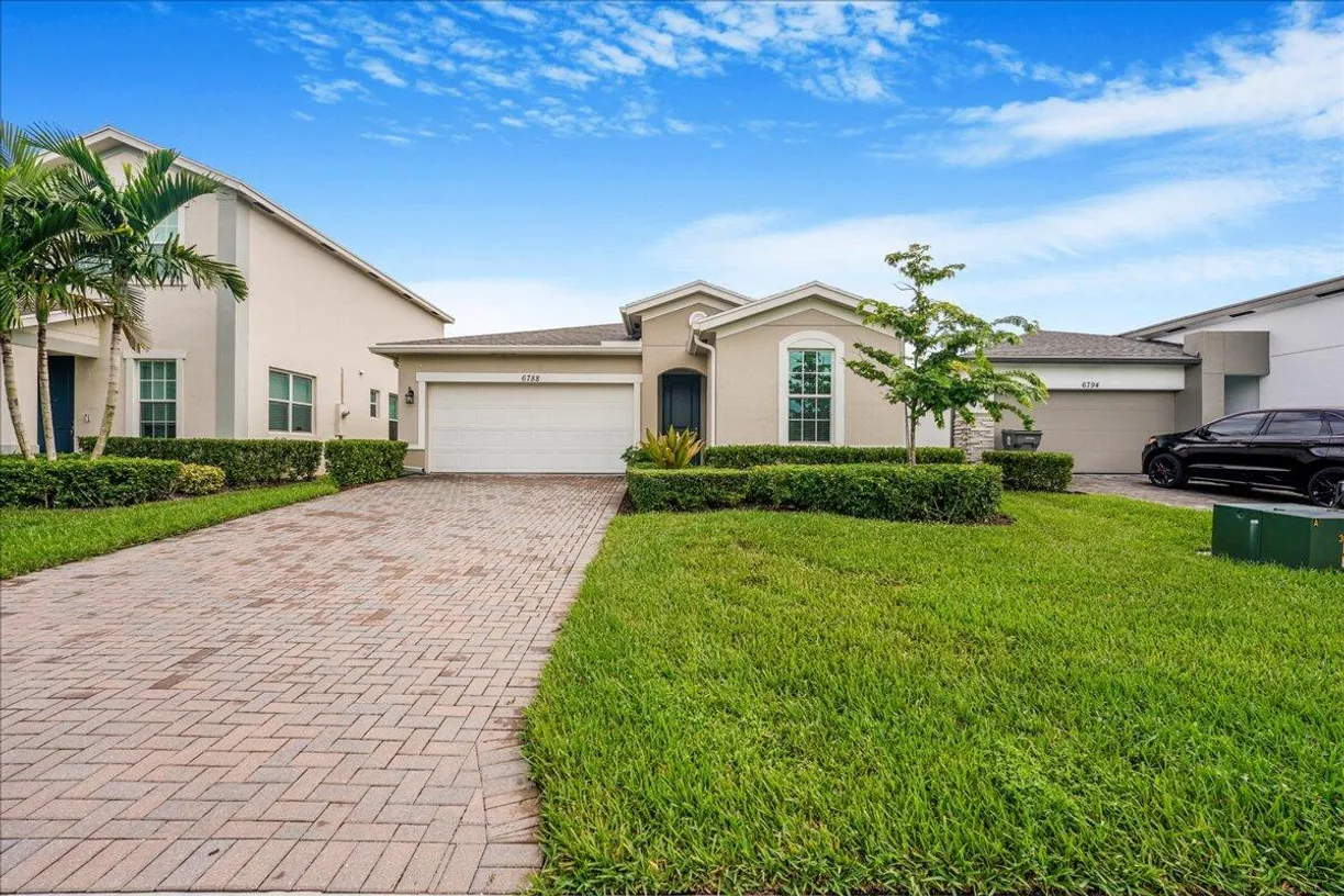 South Florida Real Estate | View 6788 Pointe Of Woods Drive | Listing