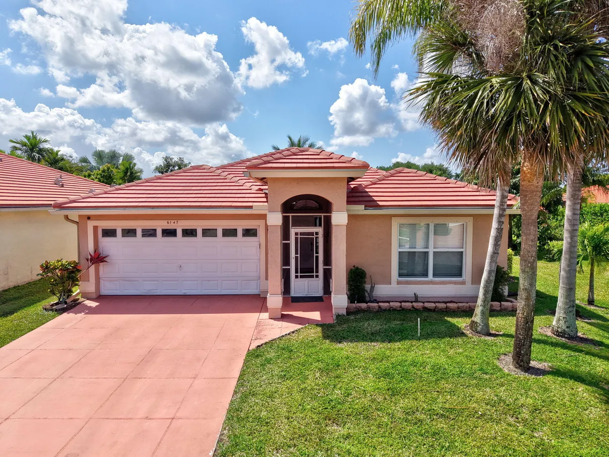 South Florida Real Estate | View 6147 Harbour Greens Drive | 3 Beds, 2 Baths