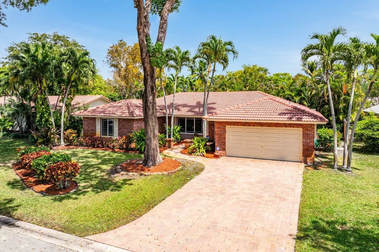 South Florida Real Estate | View 1457 NW 111th Way | 4 Beds, 2 Baths