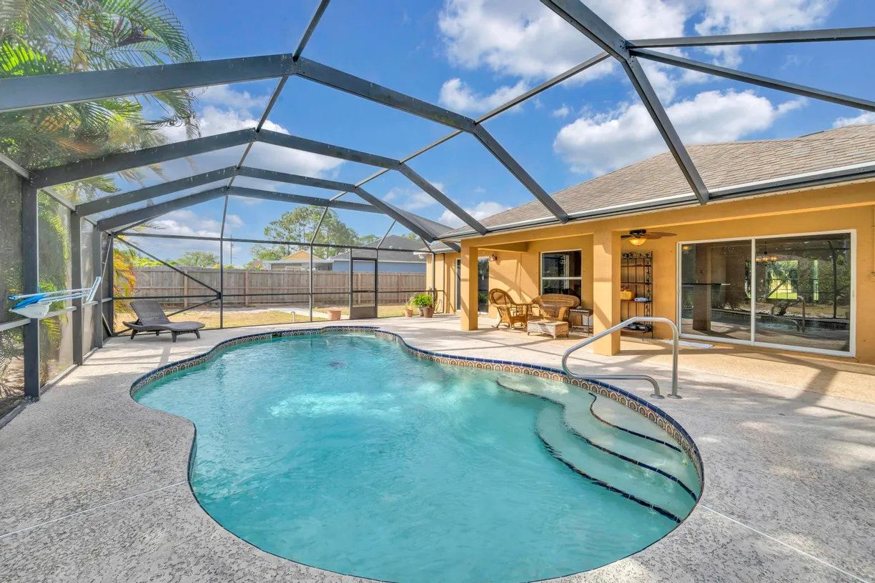 South Florida Real Estate | View 214 SW Milburn Circle | 3 Beds, 2 Baths
