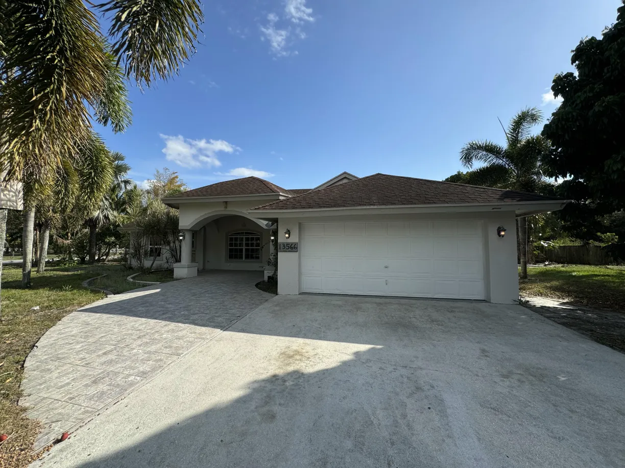 South Florida Real Estate | View 13566 69th Street | 4 Beds, 2 Baths