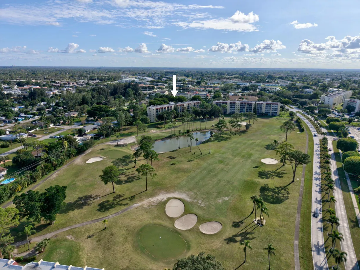 South Florida Real Estate | View 3810 Via Poinciana, 404 | 2 Beds, 2 Baths