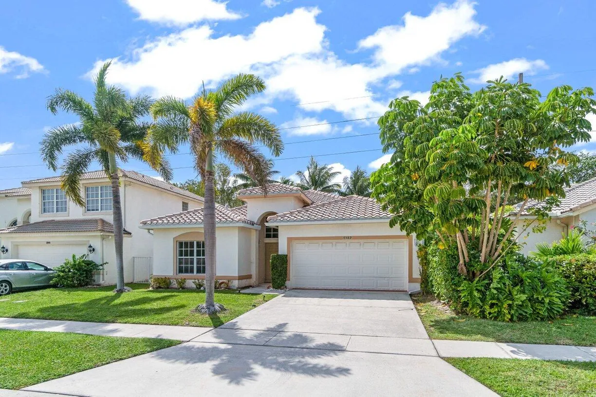 South Florida Real Estate | View 7589 Colony Lake Drive | 3 Beds, 2 Baths