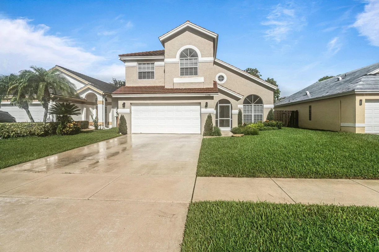 South Florida Real Estate | View 7396 Ashley Shores Circle | 4 Beds, 2 Baths
