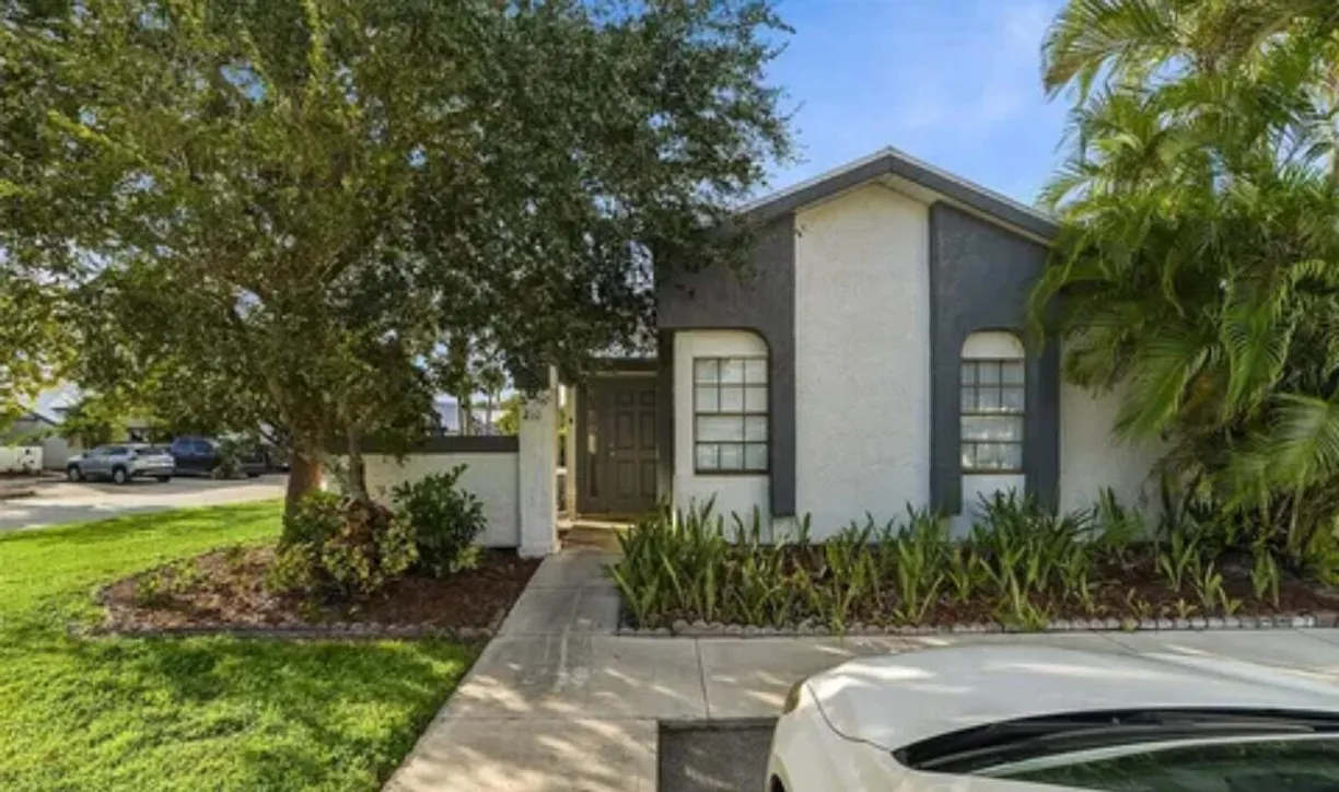 South Florida Real Estate | View 210 SW Sterret Circle | 3 Beds, 2 Baths