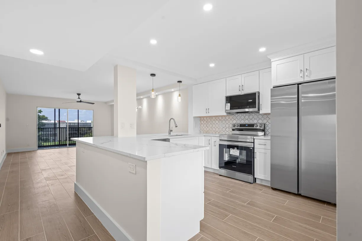 South Florida Real Estate | View 6585 Kensington Lane, 403 | 2 Beds, 2 Baths