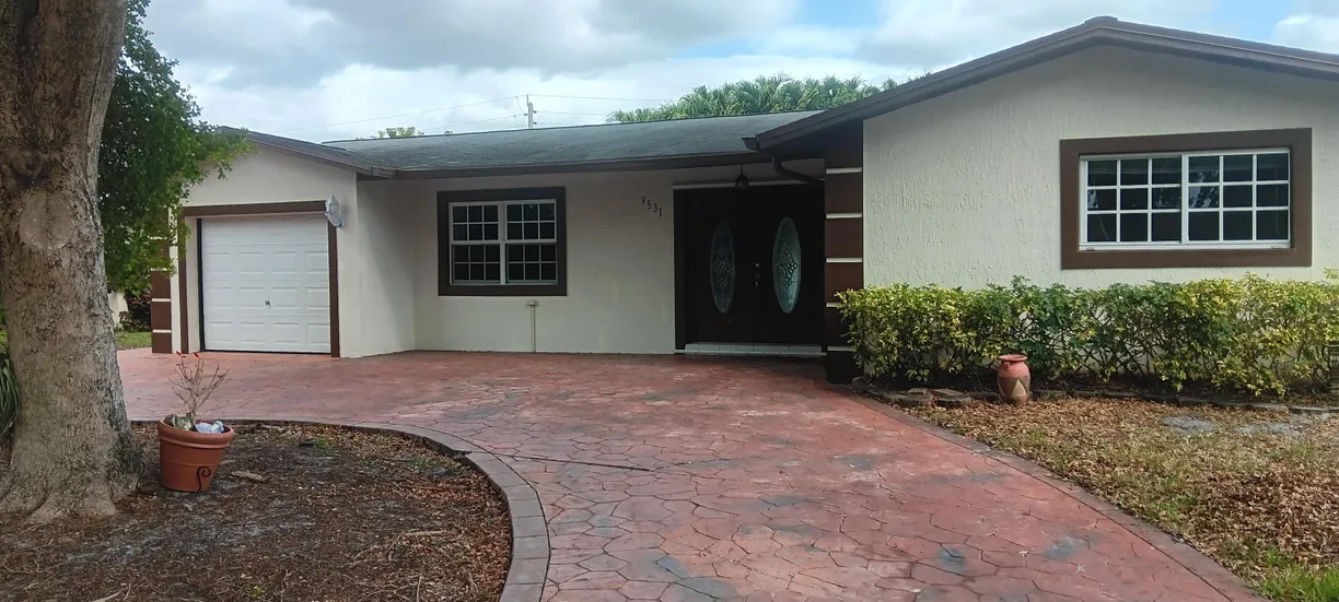 South Florida Real Estate | View 9531 NW 8th Street | 3 Beds, 2 Baths