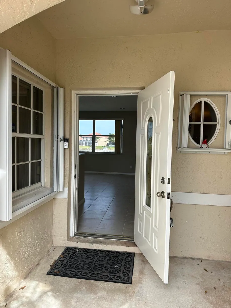 South Florida Real Estate | View 7302 Burgess Drive | 3 Beds, 2 Baths
