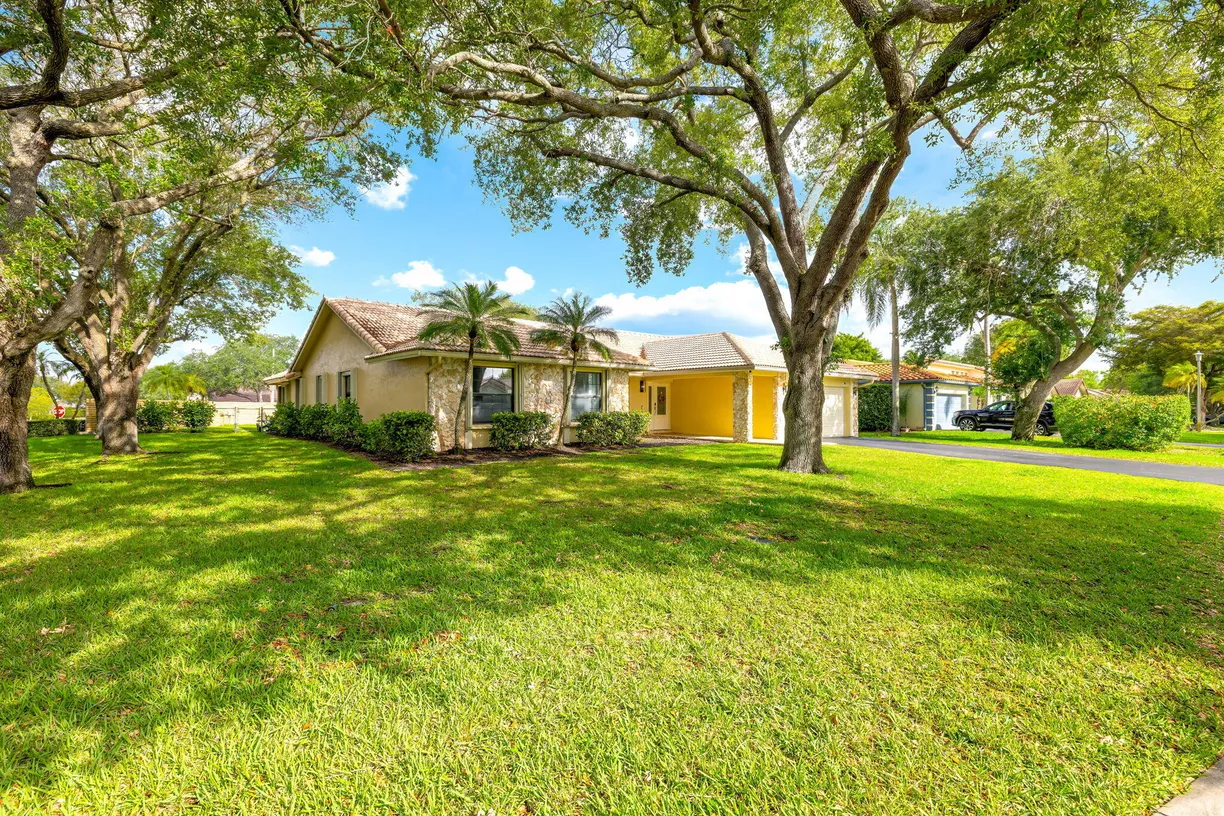 South Florida Real Estate | View 4830 NW 92nd Terrace | 4 Beds, 2 Baths