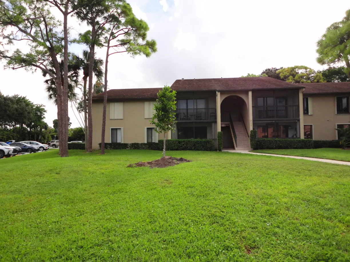 South Florida Real Estate | View 711 Sunny Pine Way, A1 | 3 Beds, 2 Baths