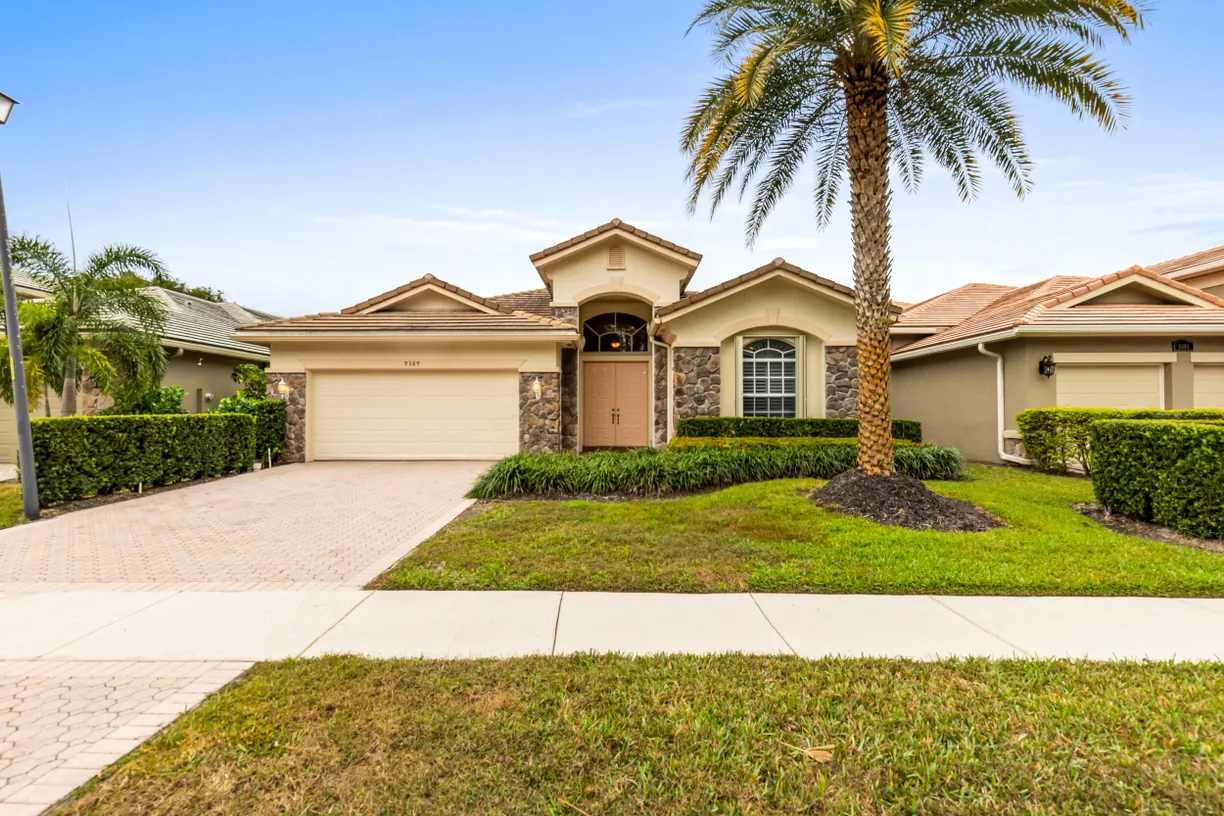 South Florida Real Estate | View 9389 Osprey Isles Boulevard | 4 Beds, 3 Baths