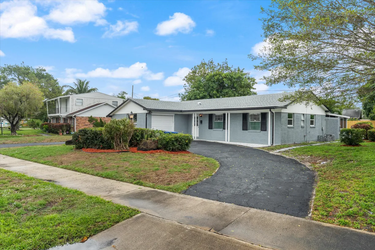 South Florida Real Estate | View 914 Orange Drive | 4 Beds, 2 Baths