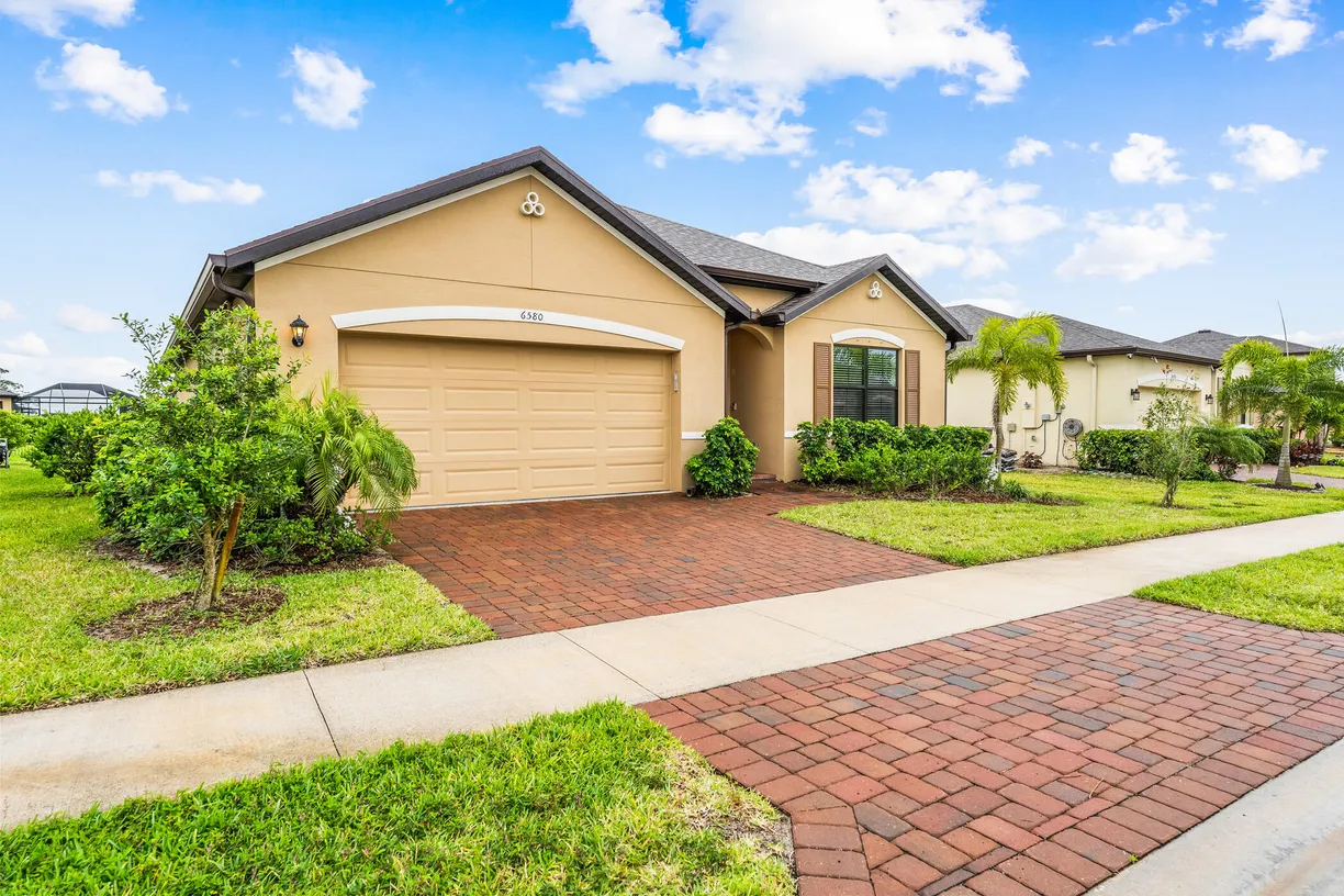 South Florida Real Estate | View 6580 Canterbridge Drive | 4 Beds, 2 Baths