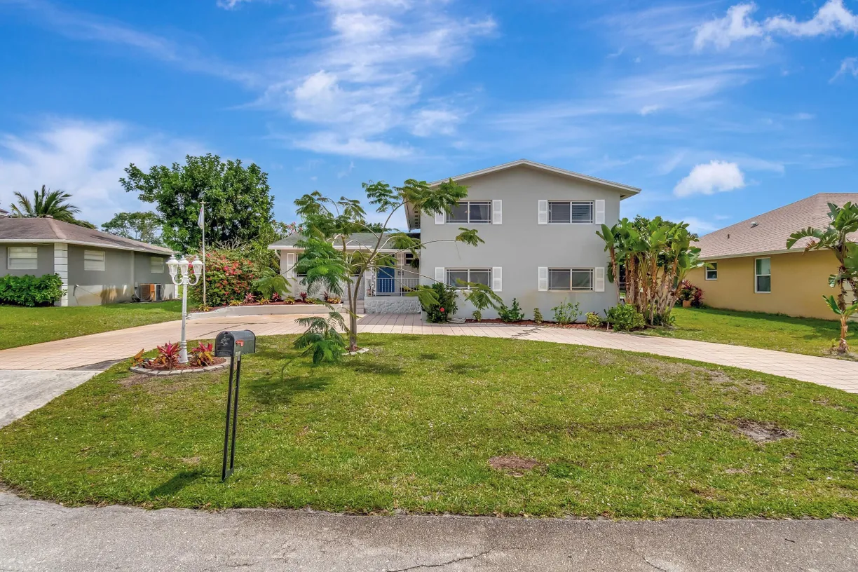South Florida Real Estate | View 6630 N Plymouth Drive | 3 Beds, 2 Baths