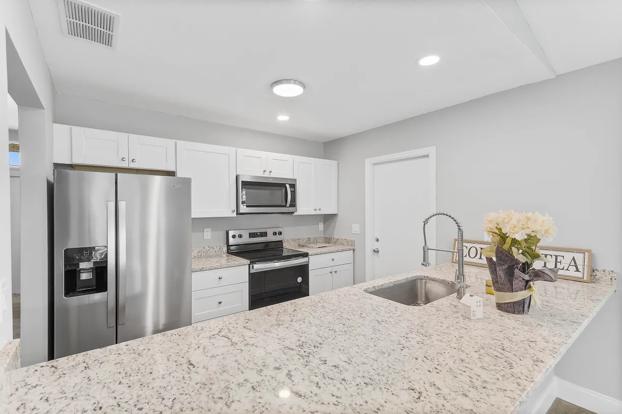 South Florida Real Estate | View 4777 SE Salvatori Road | 3 Beds, 2 Baths