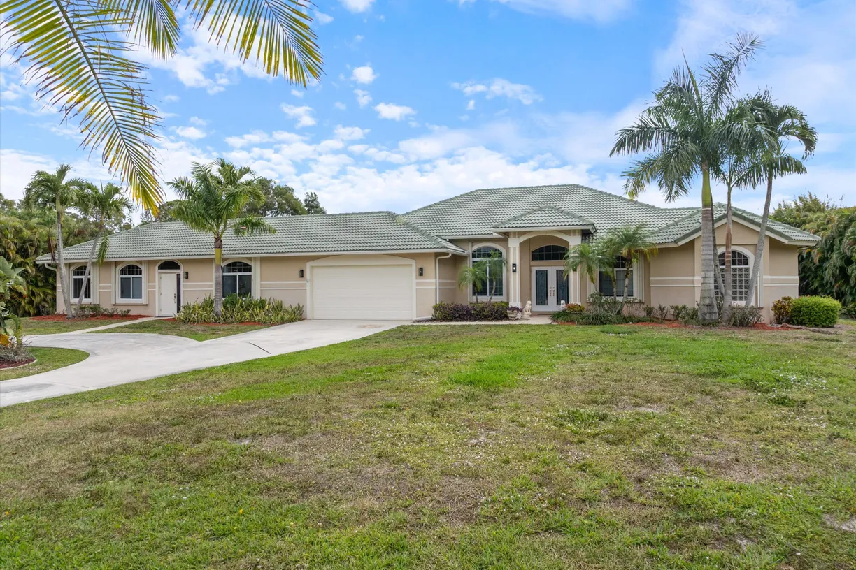 South Florida Real Estate | View 15268 75th Avenue | 5 Beds, 3 Baths