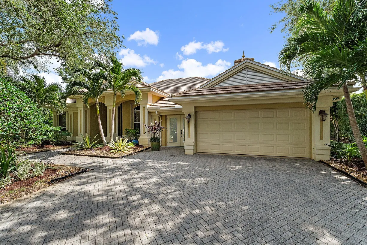 South Florida Real Estate | View 5621 SE Forest Glade Trail | 4 Beds, 3 Baths