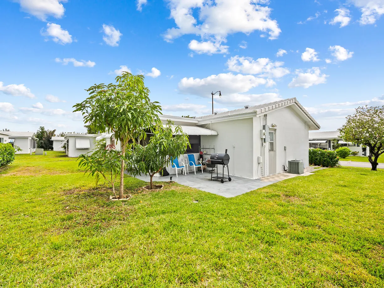 South Florida Real Estate | View 210 NW 25th Court | Listing