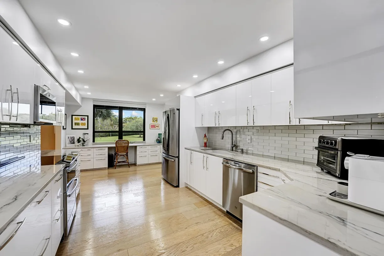 South Florida Real Estate | View 7578 Regency Lake Drive, 201 | 3 Beds, 2 Baths