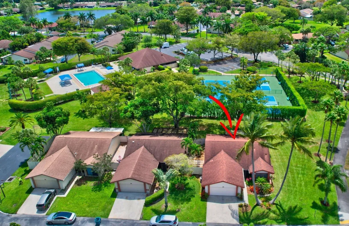 South Florida Real Estate | View 29 Fawlkland Circle | 4 Beds, 2 Baths