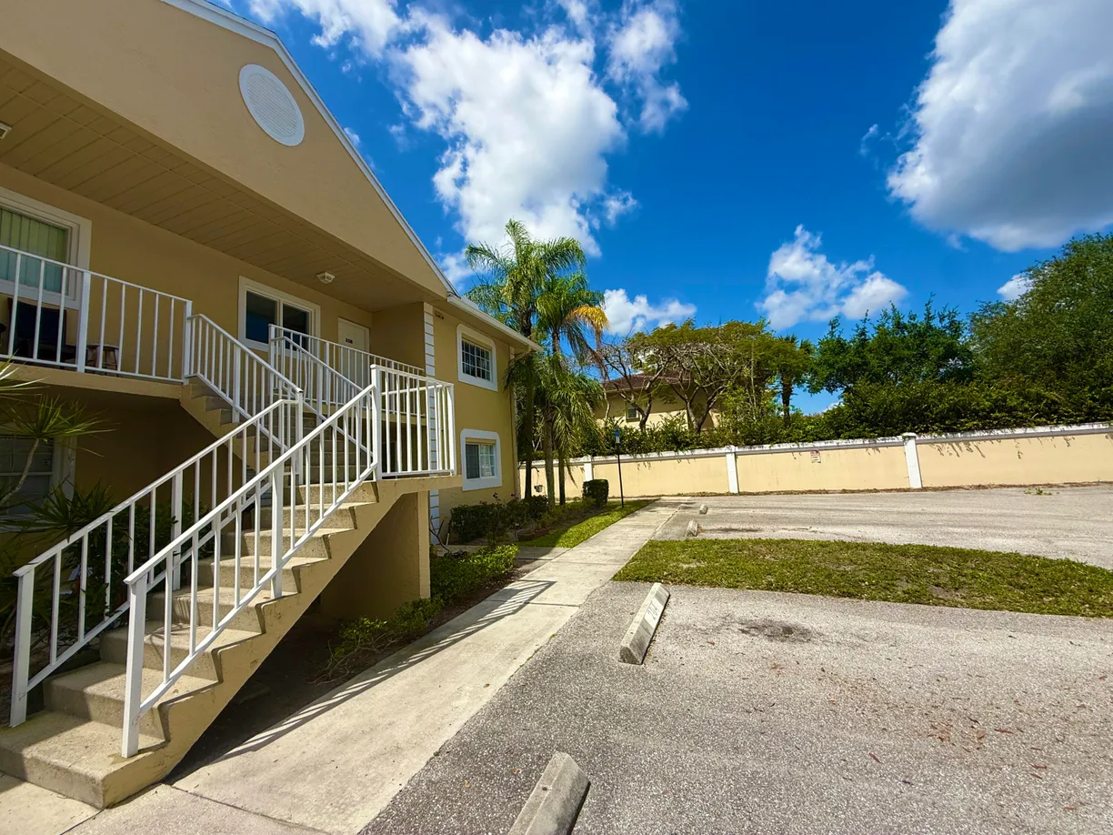 South Florida Real Estate | View 208 Palm Beach Trace Drive | 2 Beds, 2 Baths