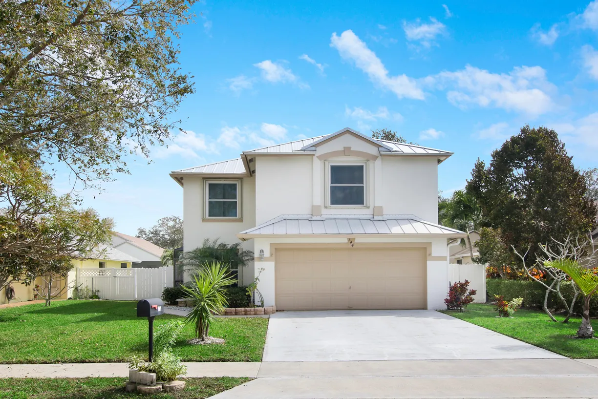 South Florida Real Estate | View 144 Pennock Landing Circle | 4 Beds, 3 Baths