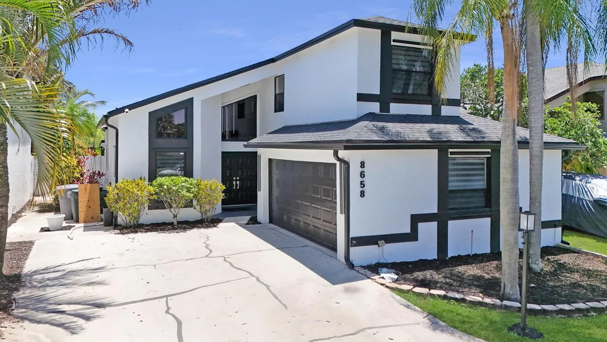South Florida Real Estate | View 8658 Kimble Way | 3 Beds, 2 Baths