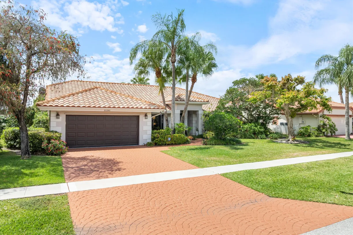 South Florida Real Estate | View 11241 Island Lakes Lane | 4 Beds, 2 Baths