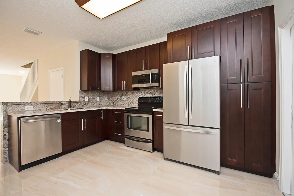 South Florida Real Estate | View 3709 San Simeon Circle | 4 Beds, 2 Baths