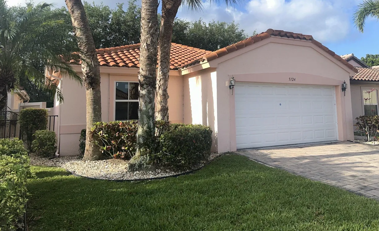 South Florida Real Estate | View 5124 Pelican Cove Drive | 3 Beds, 2 Baths