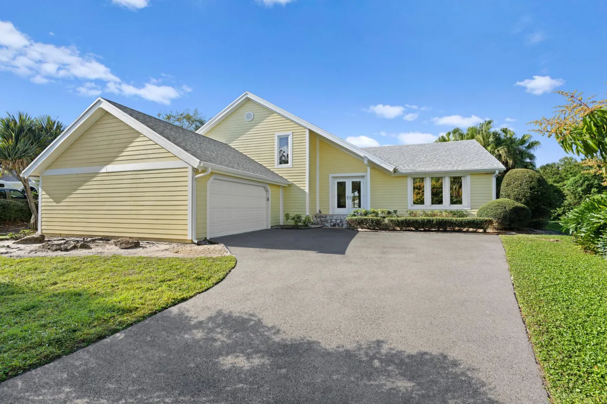 South Florida Real Estate | View 2626 SE Erickson Drive | 4 Beds, 3 Baths