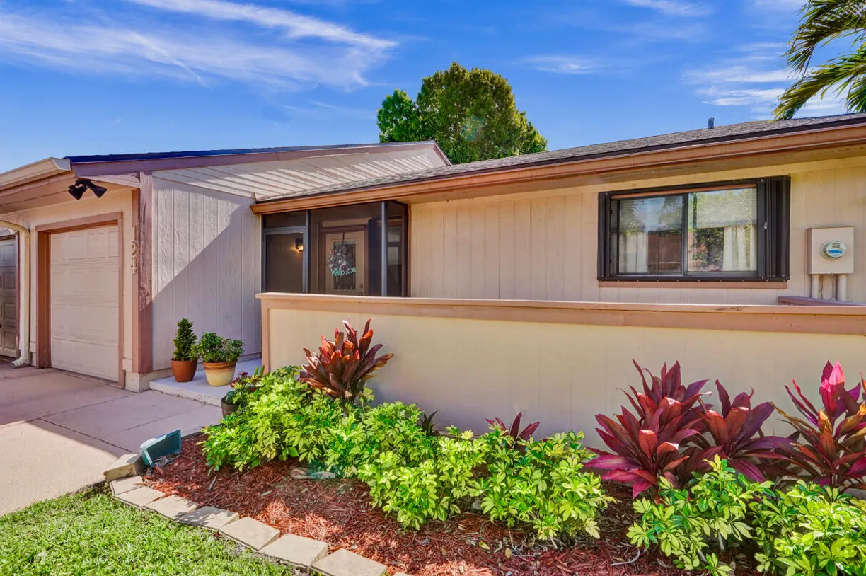 South Florida Real Estate | View 124 Mayfair Lane | 3 Beds, 2 Baths