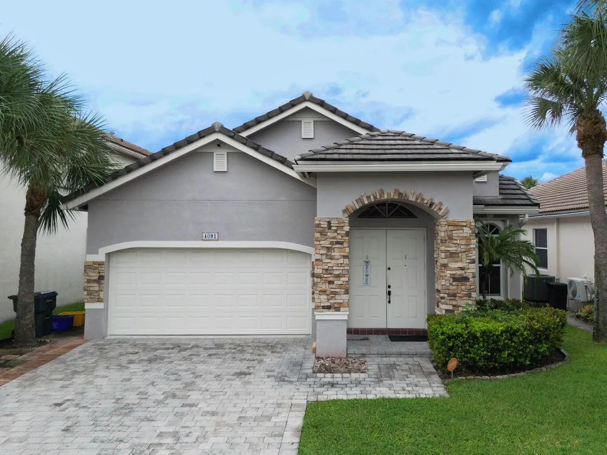 South Florida Real Estate | View 4091 Plumbago Place | 3 Beds, 2 Baths