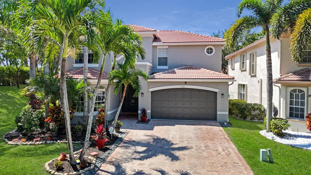 South Florida Real Estate | View 8445 Breezy Hill Drive | 5 Beds, 4 Baths
