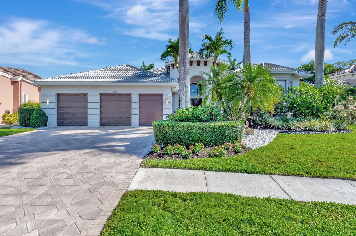 South Florida Real Estate | View 6815 Royal Orchid Circle | 4 Beds, 4 Baths