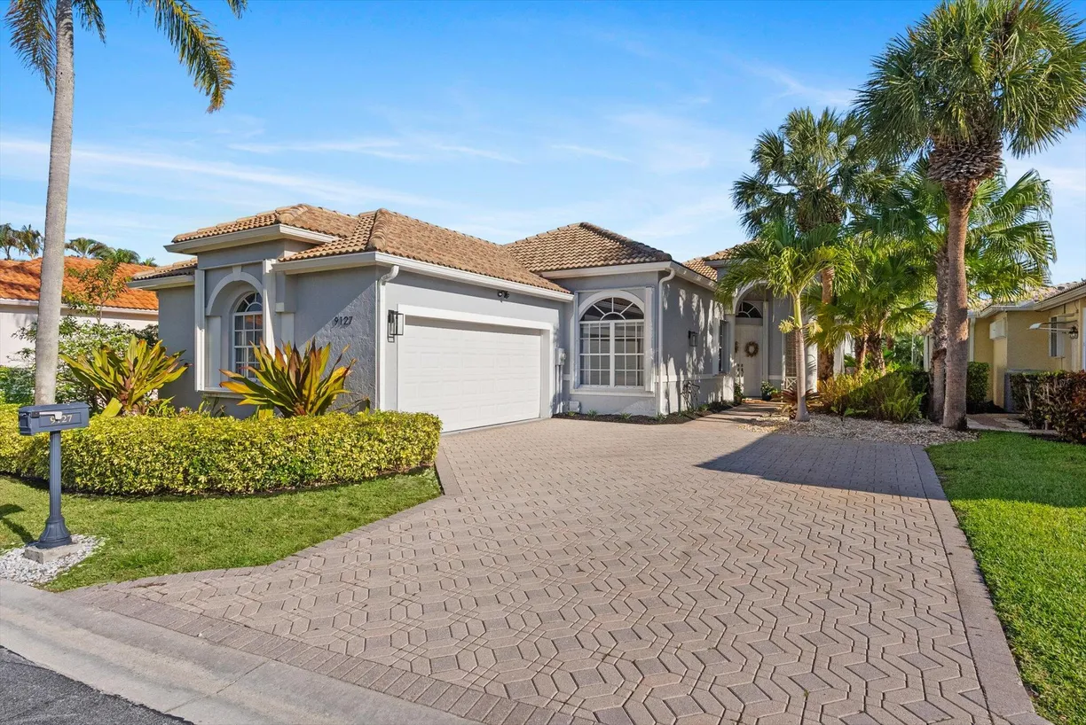 South Florida Real Estate | View 9127 Long Lake Palm Drive | 4 Beds, 2 Baths