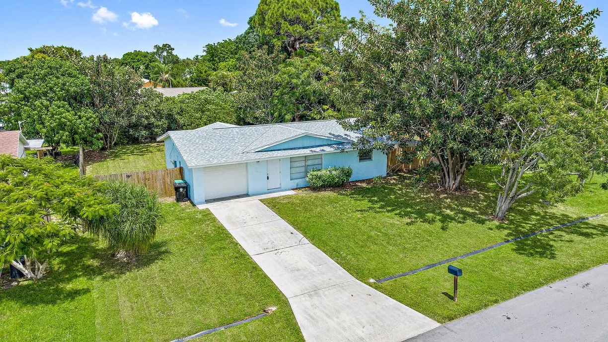 South Florida Real Estate | View 1549 SE Minorca Avenue | 2 Beds, 2 Baths