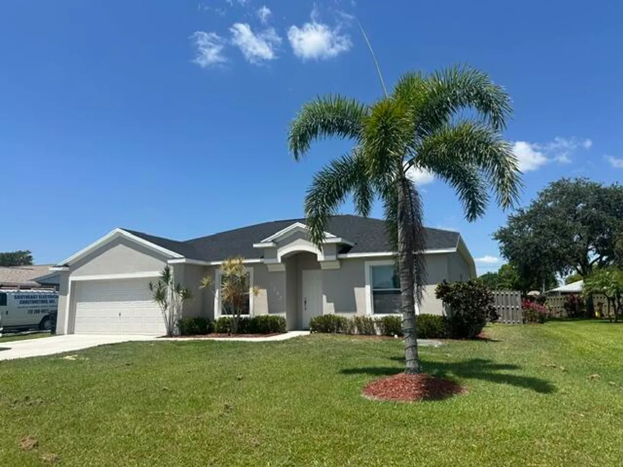 South Florida Real Estate | View 1382 SE Concha Street | 4 Beds, 2 Baths