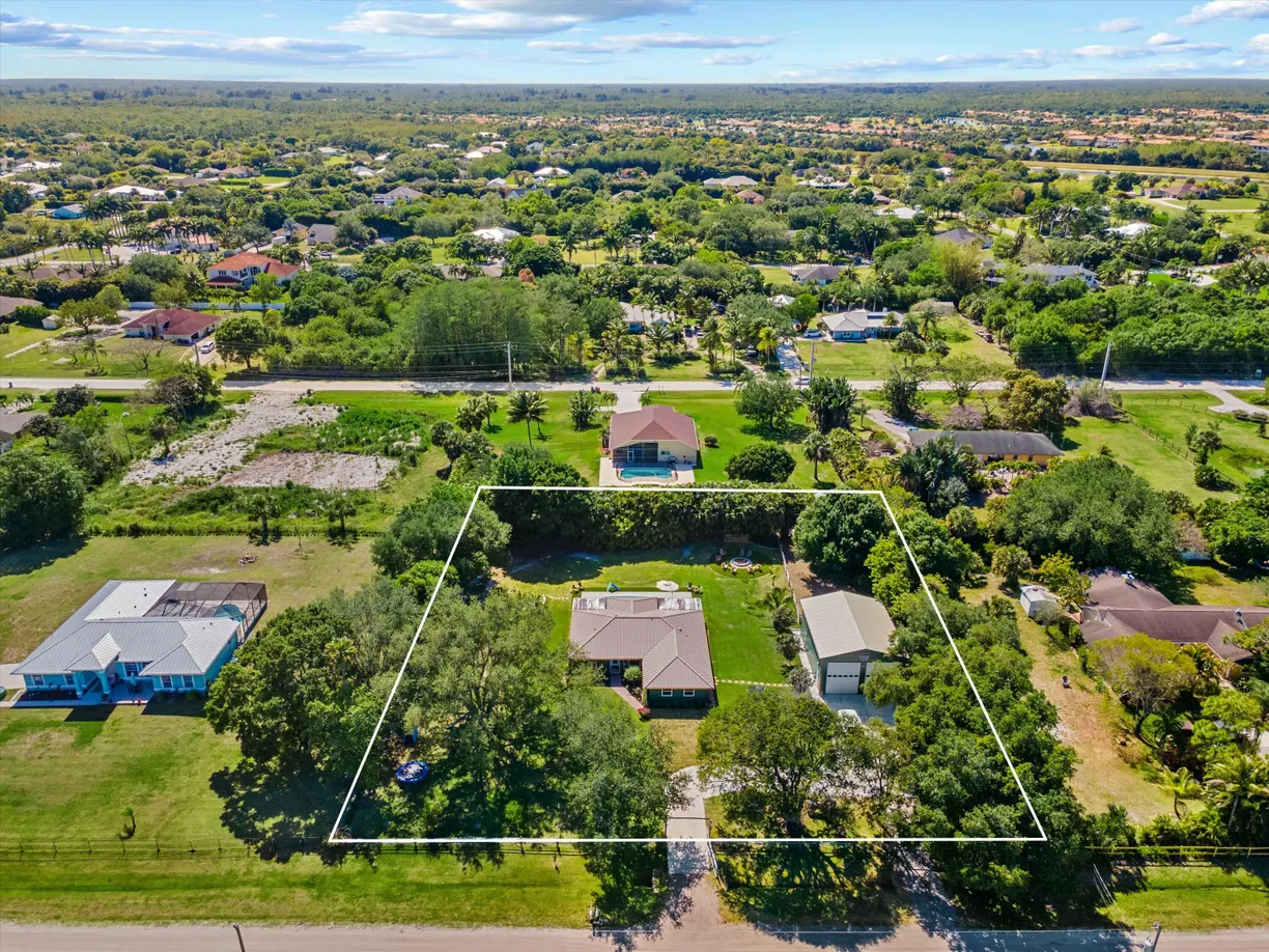 South Florida Real Estate | View 16629 74th Avenue | 4 Beds, 2 Baths